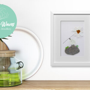 Sea Glass Bird on Rock With Flower