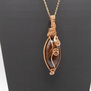 Double sided Baltic Amber in rose gold wire