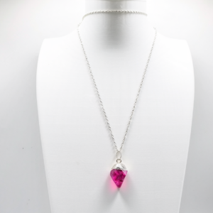 Raw Ruby set in silver on chain