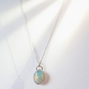 2.5 CT OVAL OPAL SILVER