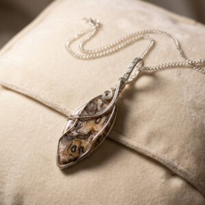 Agatised Palm Root necklace with natural earthy patterns, wrapped in silver-plated wire and finished with an 18-inch chain.