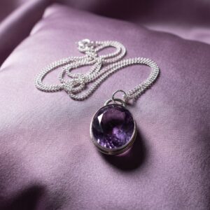 20.25ct faceted purple amethyst statement necklace in a handcrafted fine and sterling silver setting with an 18-inch chain.