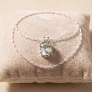 5ct faceted green amethyst necklace in a sterling silver claw setting with a 20-inch Singapore chain.
